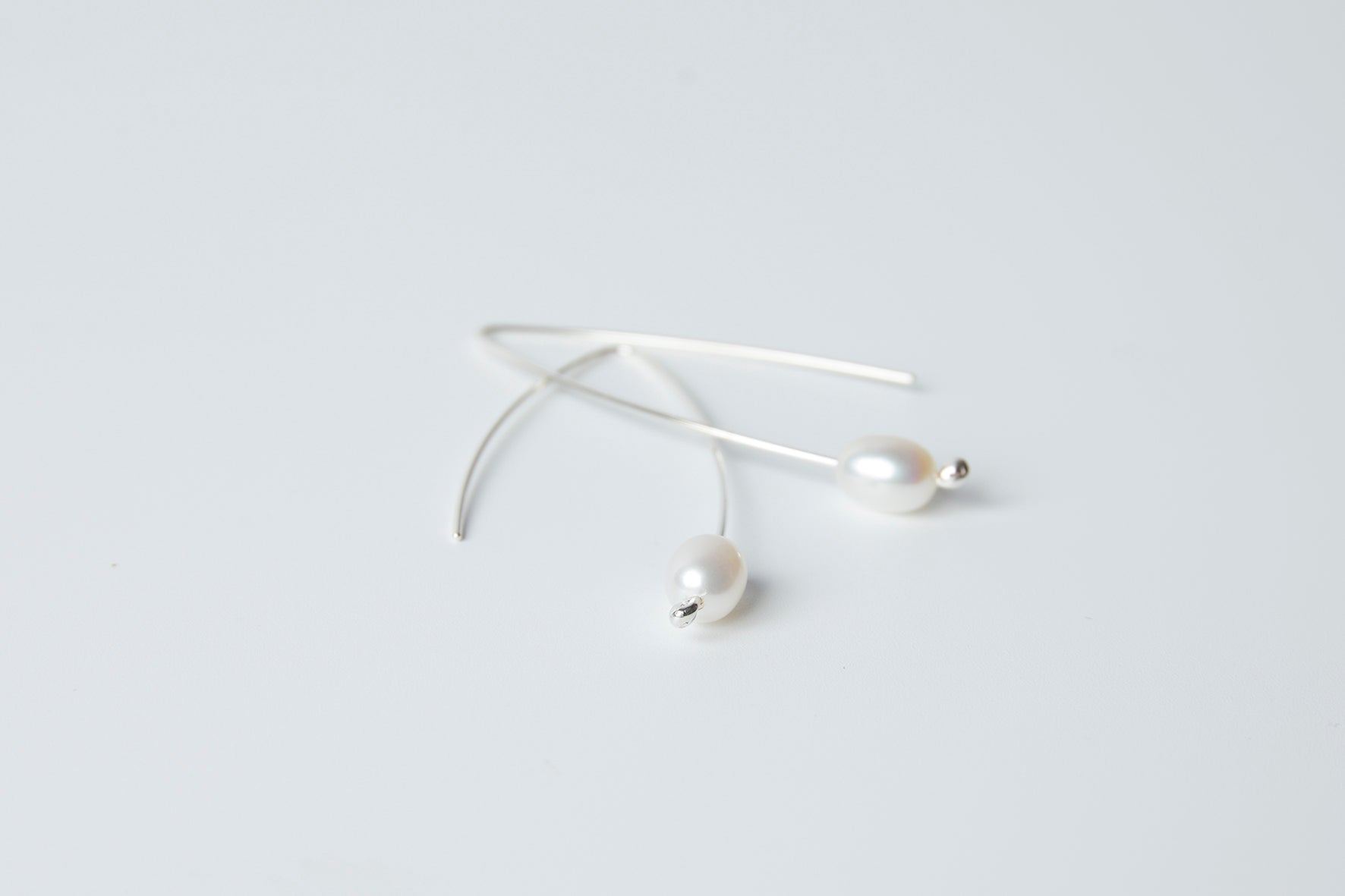 Long pearl earrings