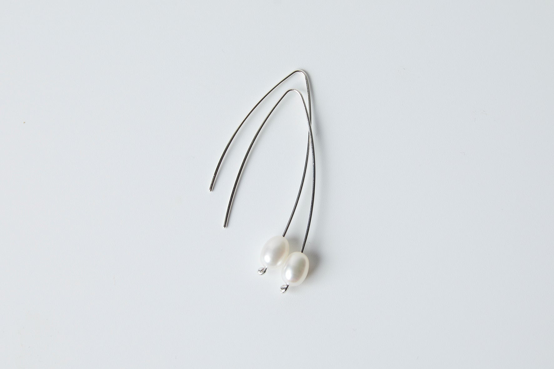 Long pearl earrings