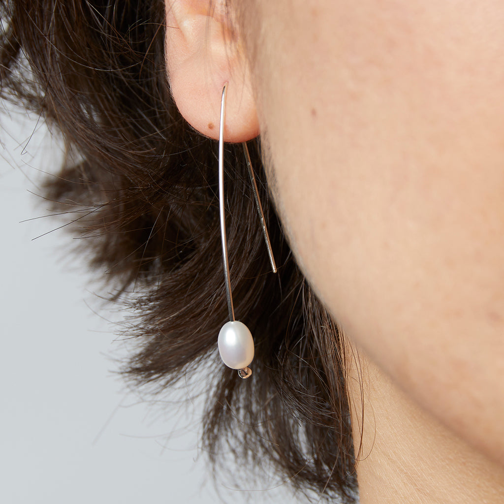 Long pearl earrings