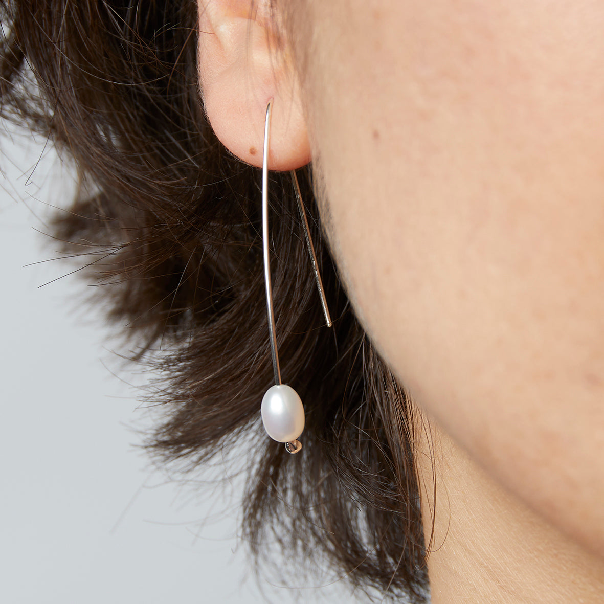 Long pearl earrings